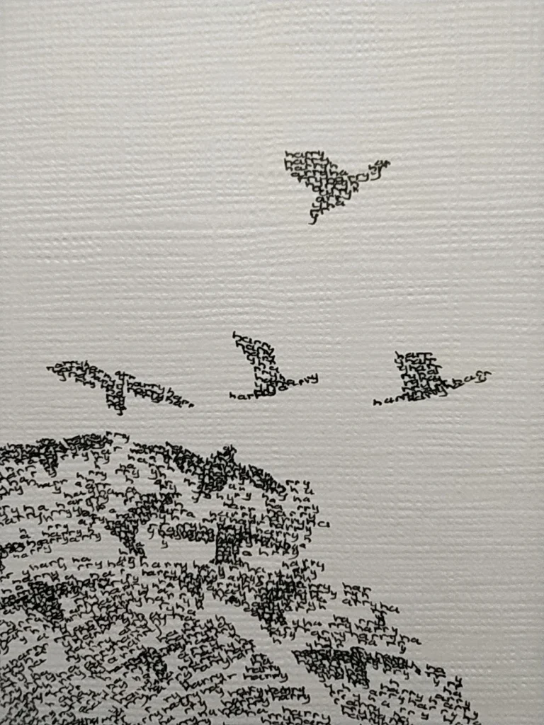 Fingerprint calligram with birds, close-up