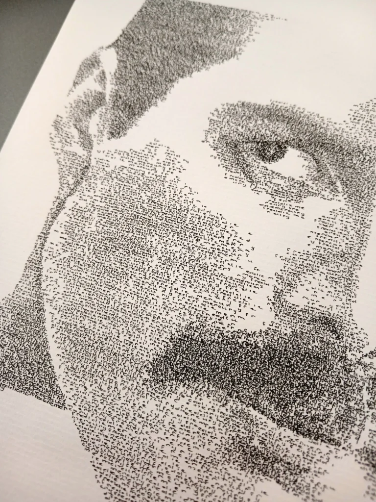 Close-up of the Freddie Mercury calligram showing the tiny handwritten words