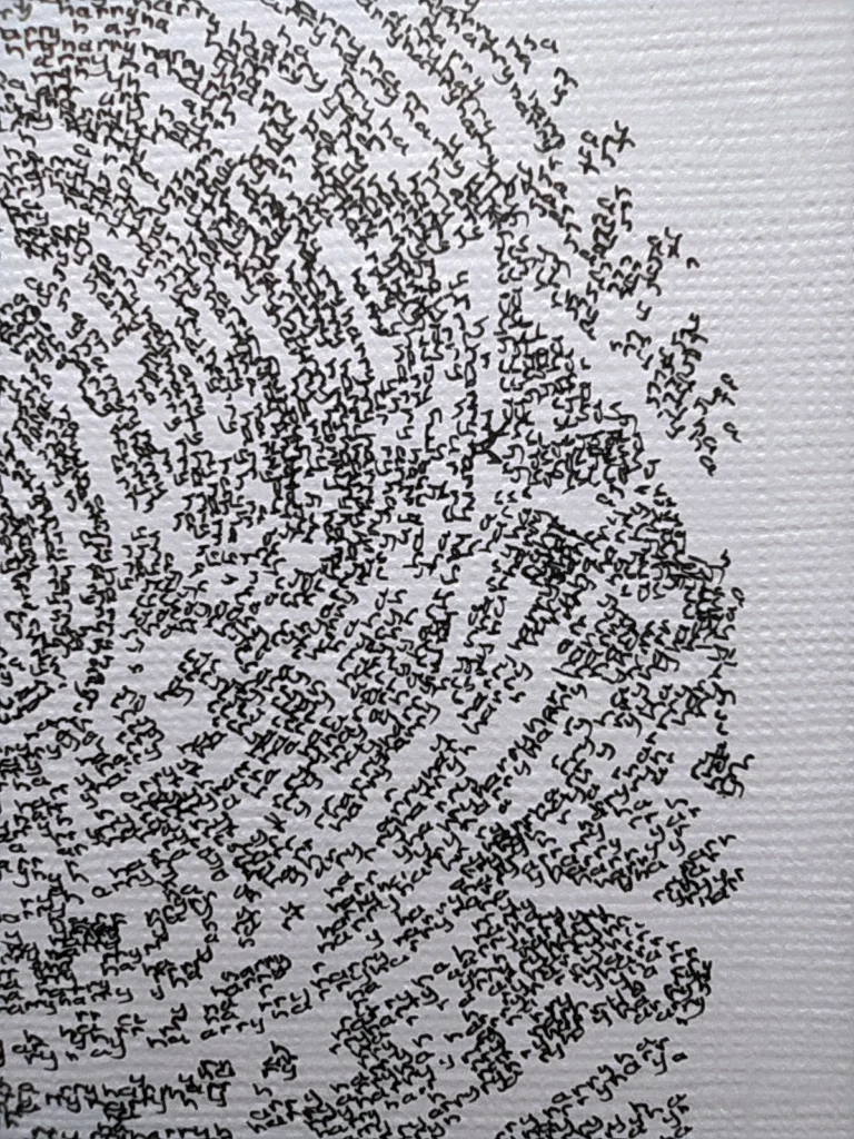 Close-up of a fingerprint calligram written with tiny words