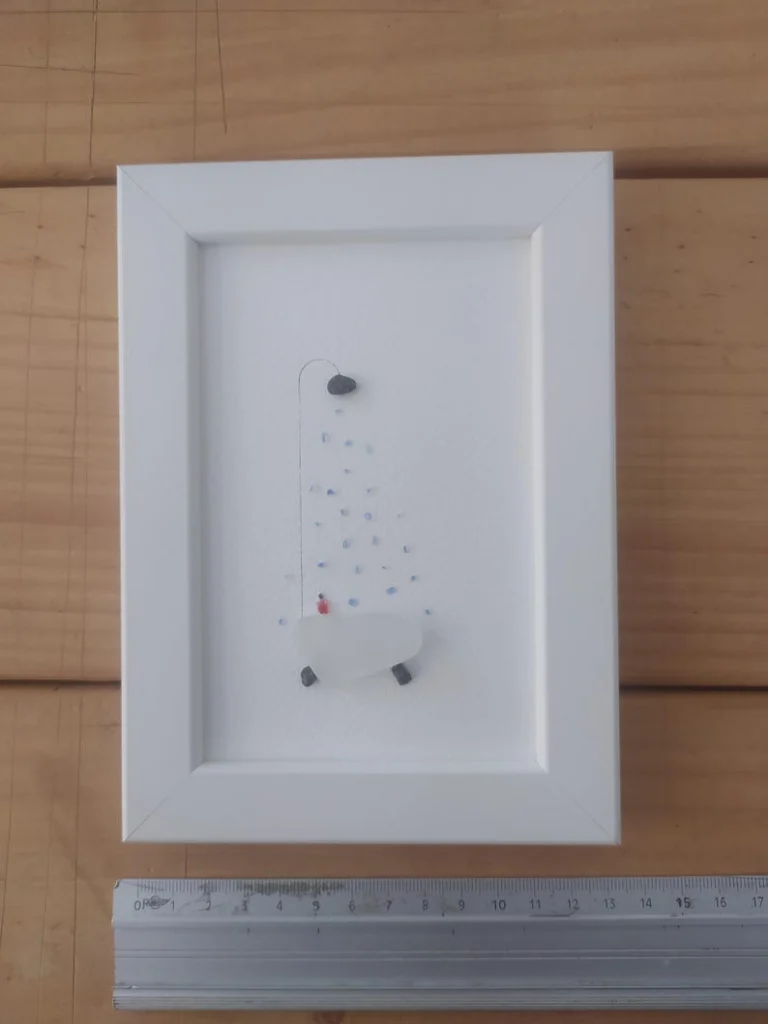 Framed sea glass bathroom decoration