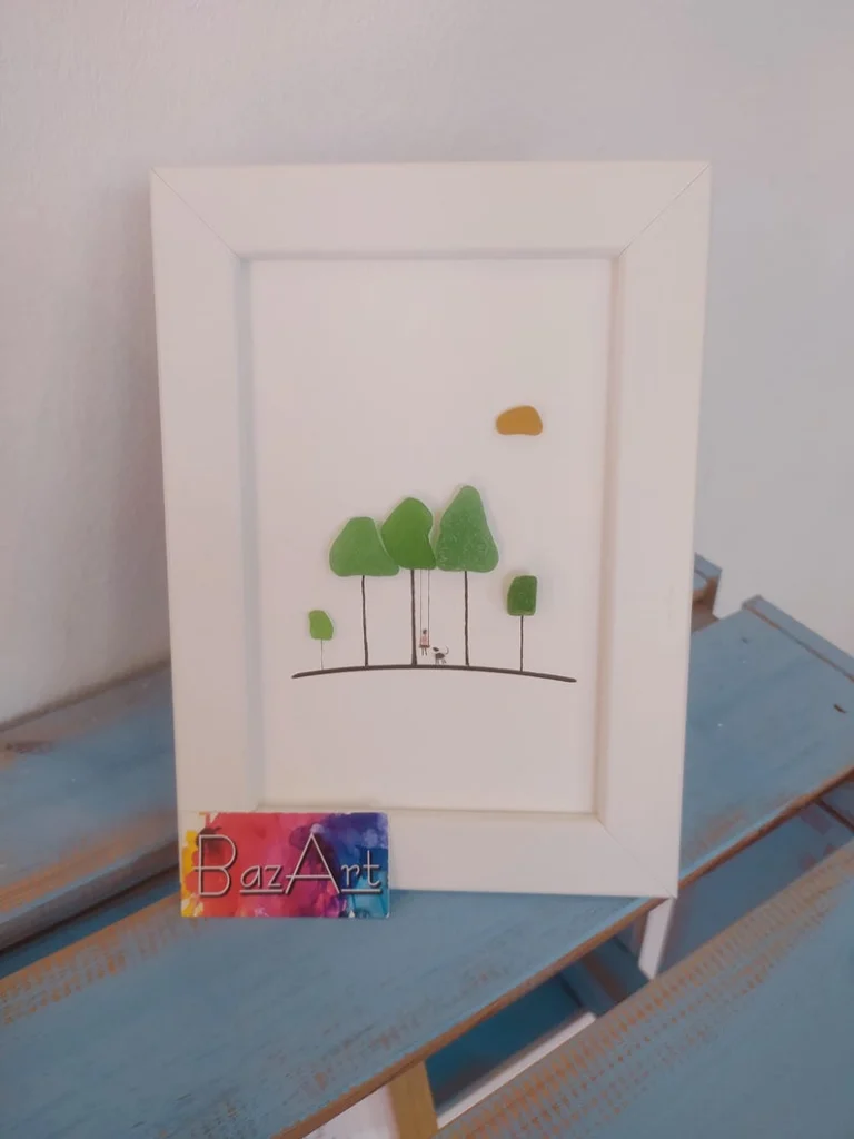 Green sea glass trees with a swing